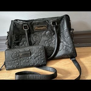 Pleather handbag with matching wallet. Never used.